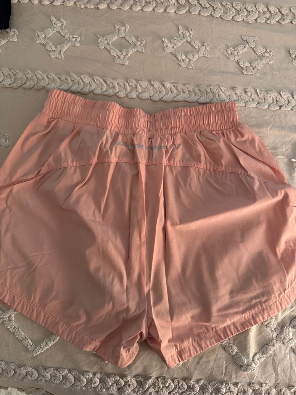 alphalete orange running shorts